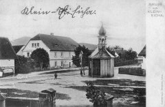 dobová pohlednice vsi s kaplí