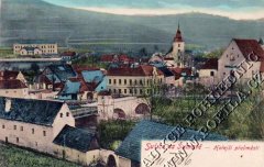 dobová pohlednice města s kaplí na mostě