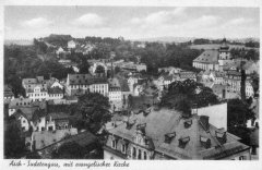 dobová pohlednice města s kostelem