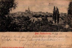 dobová pohlednice vsi s kostelem
