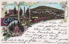 dobová pohlednice vsi s kostelem