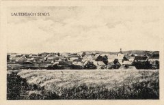 historické foto města s kostelem