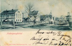 dobová pohlednice vsi s kostelem (věž v pozadí)