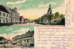 dobová pohlednice vsi s kostelem