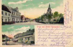 dobová pohlednice vsi s kostelem