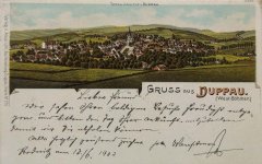 historické foto města s kostelem (vlevo)