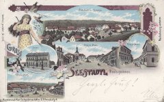 dobová pohlednice vsi s kostelem