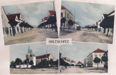 dobová pohlednice vsi s kostelem a kaplí
