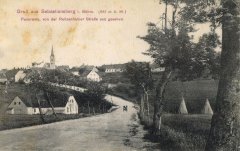 dobová pohlednice vsi s kostelem