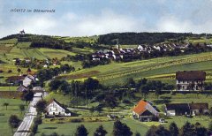 dobová pohlednice městyse s kostelem (v pozadí)