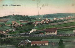 dobová pohlednice městyse s kostelem (vlevo nahoře)