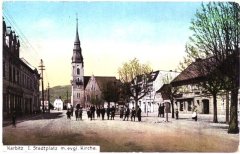 dobová pohlednice města s kostelem