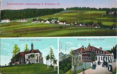 dobová pohlednice vsi s kostelem