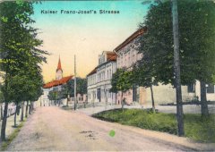 dobová pohlednice vsi s kostelem (výřez)