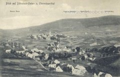 dobová pohlednice vsi s kostelem