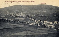 dobová pohlednice vsi s kostelem (kostel v popředí)