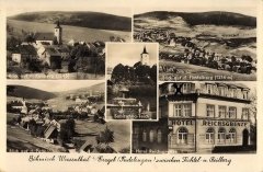 dobová pohlednice vsi s kostelem