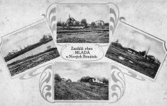 dobová pohlednice vsi s kostelem