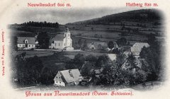 dobová pohlednice vsi s kostelem