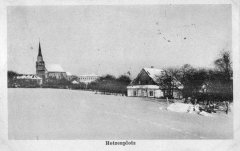 dobová pohlednice města s kostelem