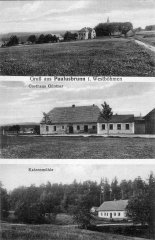 dobová pohlednice vsi s kostelem