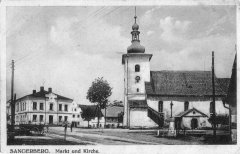 dobová pohlednice vsi s kostelem