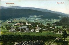 dobová pohlednice vsi s kostelem