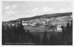 dobová pohlednice vsi s kostelem