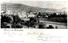 dobová pohlednice vsi s kostelem