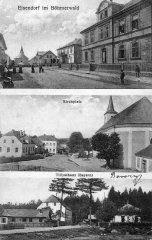 dobová pohlednice vsi s kostelem