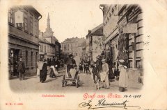 dobová pohlednice města s kostelem (věž v pozadí)