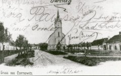 dobová pohlednice městské čtvrti s kostelem