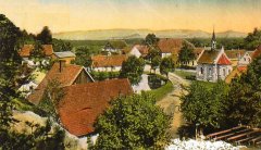 dobová pohlednice vsi s kaplí