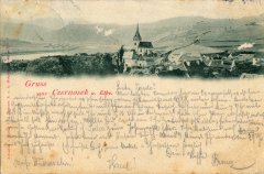 dobová pohlednice vsi s kostelem