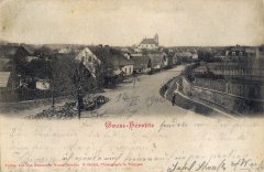 dobová pohlednice vsi s kostelem