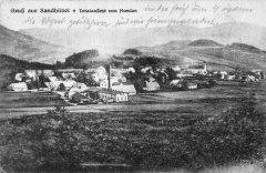 dobová pohlednice vsi s kostelem