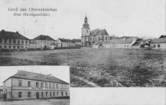 dobová pohlednice vsi s kostelem