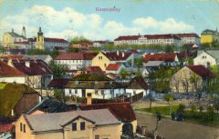 dobová pohlednice vsi s kostelem (vlevo na obzoru)