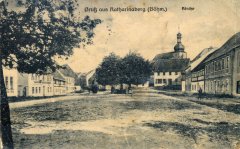 dobová pohlednice vsi s kostelem