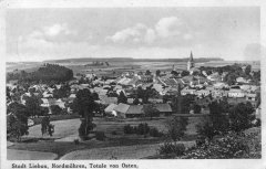 dobová pohlednice města s kostelem