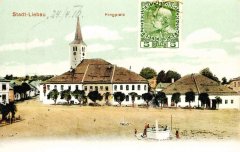 dobová pohlednice města s kostelem