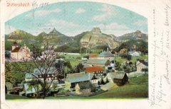 dobová pohlednice vsi s kostelem