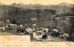 dobová pohlednice vsi s kostelem