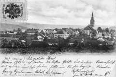 dobová pohlednice vsi s kostelem