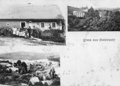 dobová pohlednice vsi s kostelem
