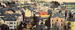 kolorovaná pohlednice města se synagogou