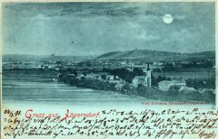 dobová pohlednice vsi s kostelem