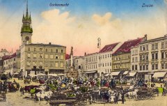 dobová pohlednice náměstí s kostelem přestavěným na tzv. "špalíček"
