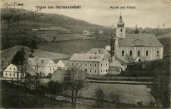 dobová pohlednice vsi s kostelem