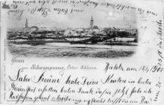 dobová pohlednice vsi s kostelem